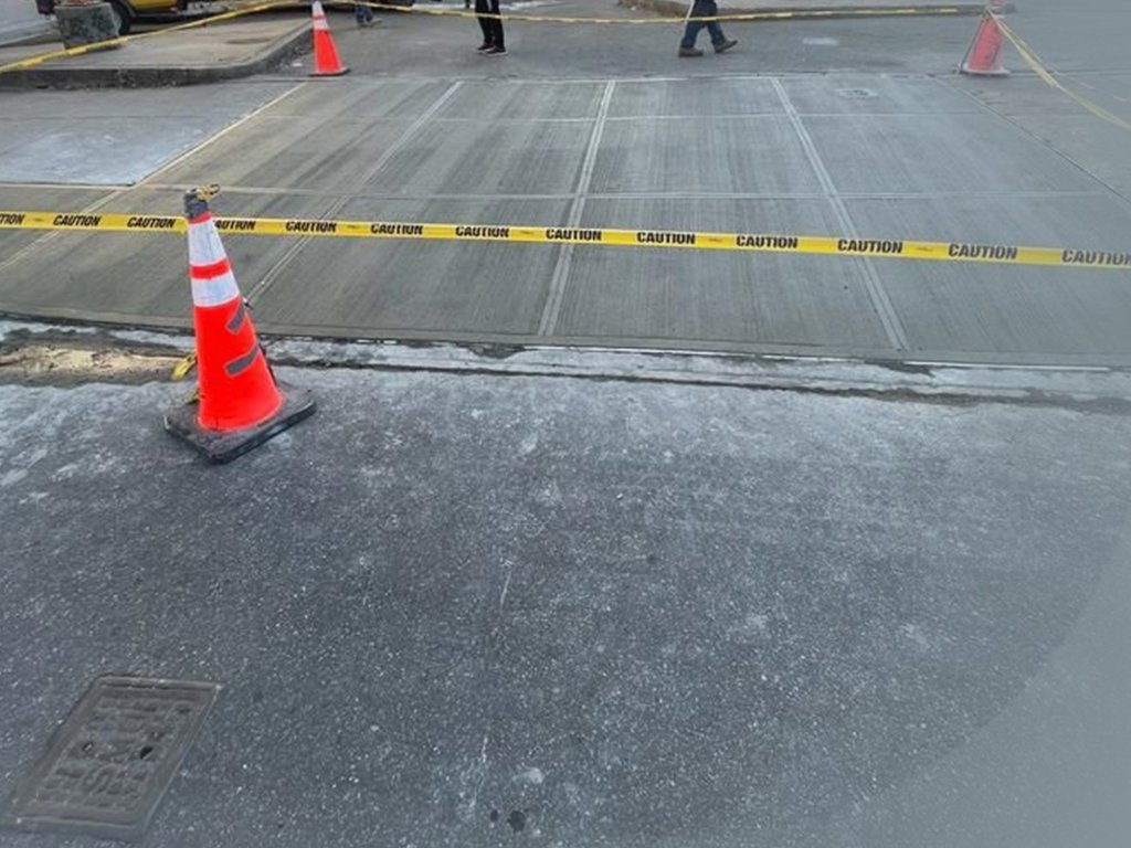 Violation-free concrete walkway finished by Sidewalk Repairs Manhattan